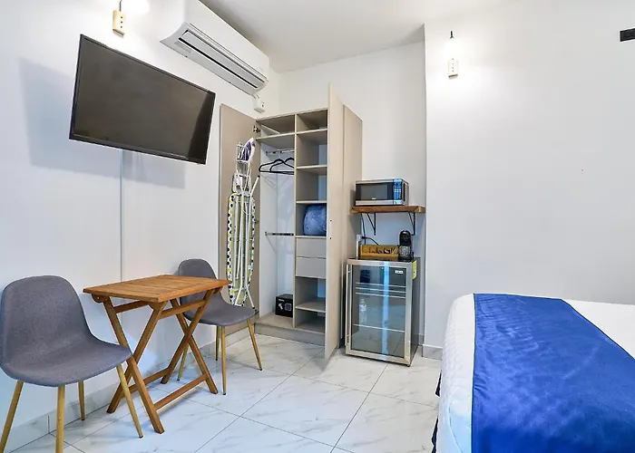 Apartaestudios La Capital